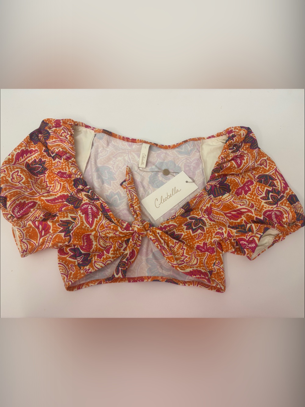 NWT Cleobella "Tropique" paisley bikini top features a tie-front